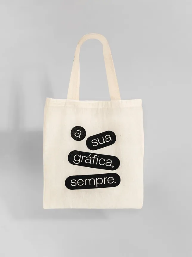 Ecobag sustentável em algodão cru 30x40 cm, personalizável, ideal para brindes empresariais e transporte de produtos.
